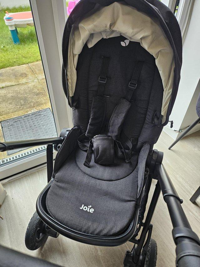Preview of the first image of Joie versatrax pushchair all black.