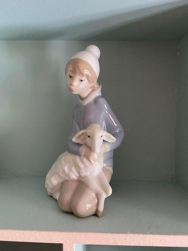 Preview of the first image of LLADRO SHEPHERD BOY WITH LAMB Ornament.