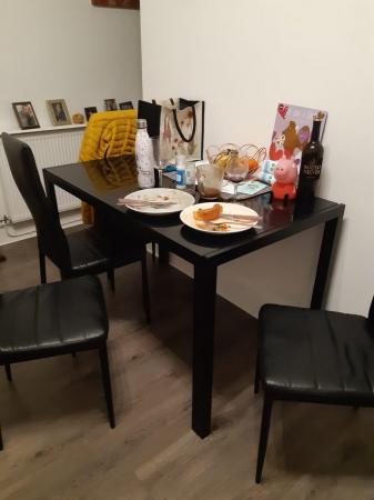 Image 2 of Black glass dining table and 4 chairs