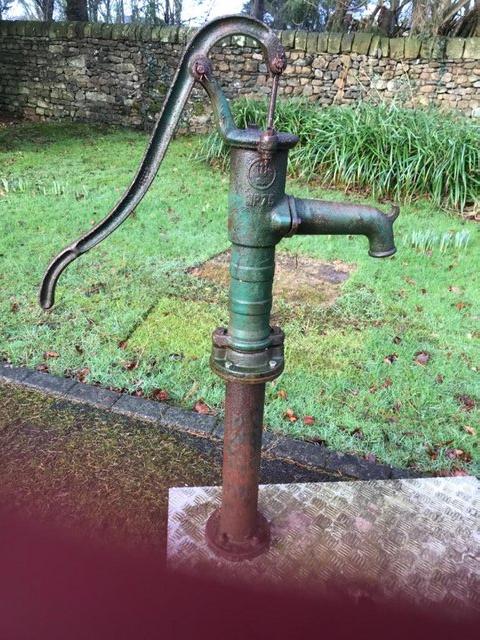 Preview of the first image of Old hand operated cast iron water pump.