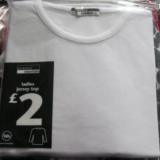 Preview of the first image of NEW White Long-sleeved T-shirt, size 10..