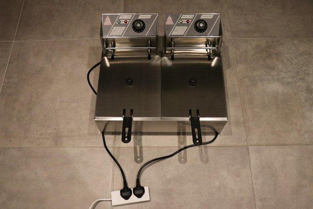 Preview of the first image of Double Deep Fryer 21.6L 5000W Easy Clean, Quick Fry, Large.