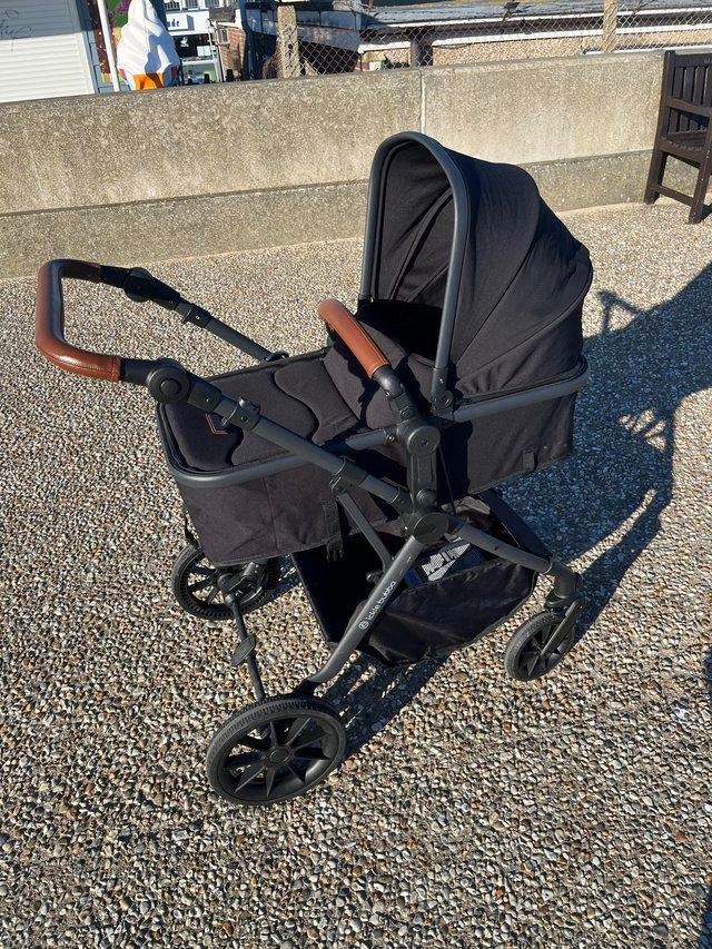 Preview of the first image of COSMO ALL IN ONE I-SIZE TRAVEL SYSTEM & ISOFIX BASE × 1.