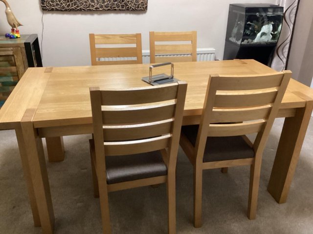 Preview of the first image of Extending Dining Table and 6 Chairs.