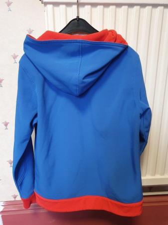 Image 3 of Girl Guide blue and red hoodie.