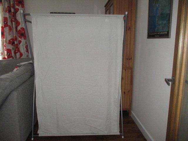 Preview of the first image of White canvas wardrobe for sale..