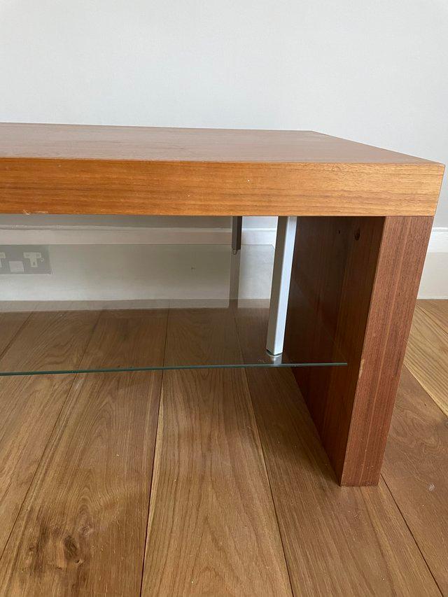 Preview of the first image of DWELL Walnut and glass TV media unit.
