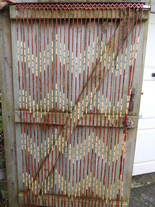 Preview of the first image of Bamboo beaded door curtains, set of 3, £15.