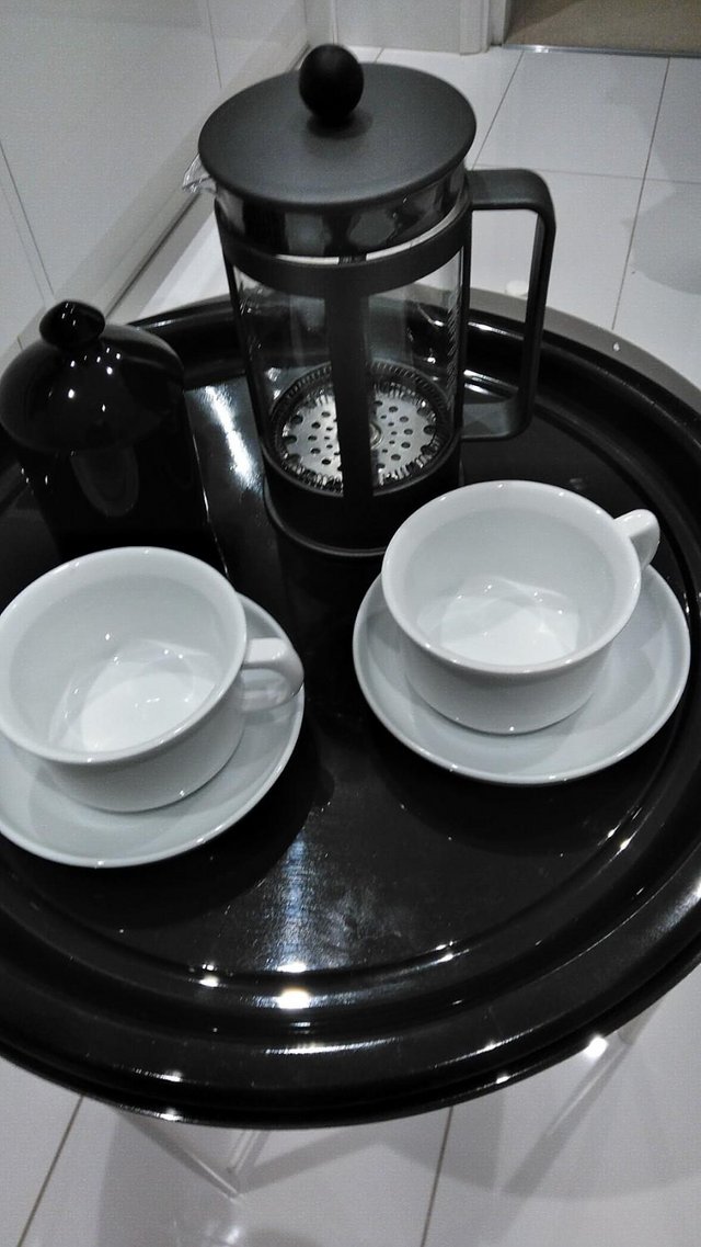 Preview of the first image of French press coffee maker with coffee cups and sugar bowl.
