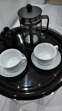 Image 1 of French press coffee maker with coffee cups and sugar bowl