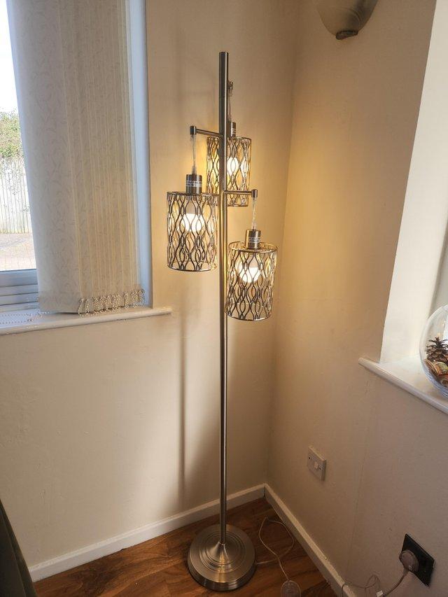 Preview of the first image of Floor standing triple light lamp.