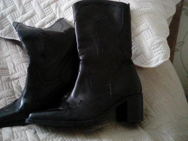 Preview of the first image of Ladies Black leather Western style boots.