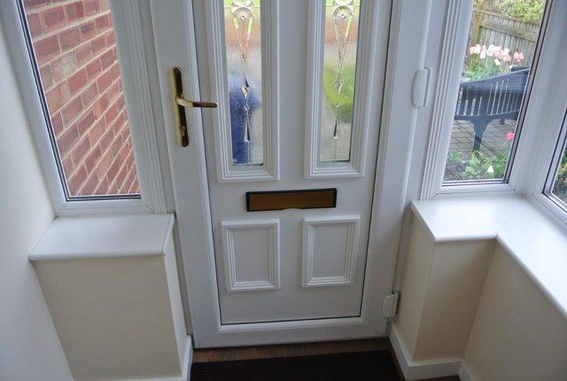 Image 2 of UPVC Front Door with frame, sill and decorative trim