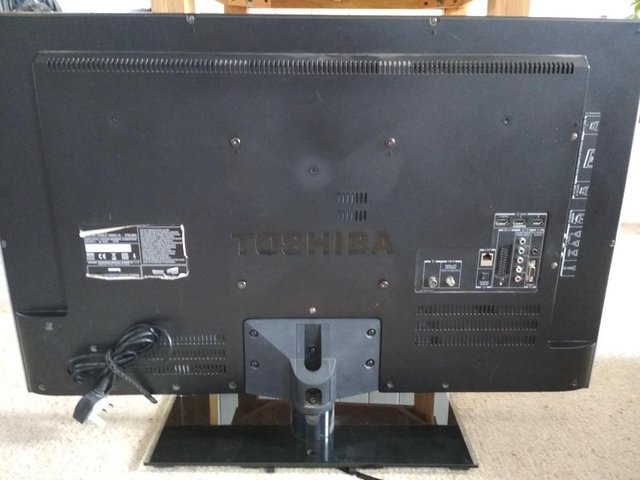 Preview of the first image of Toshiba 37" television 37SL863, remote and WLAN adapter.