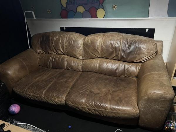 Image 1 of Brown leather sofa for free