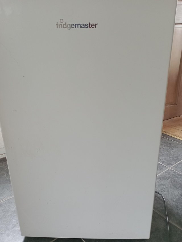 Preview of the first image of Nearly new white fridge in vgc.