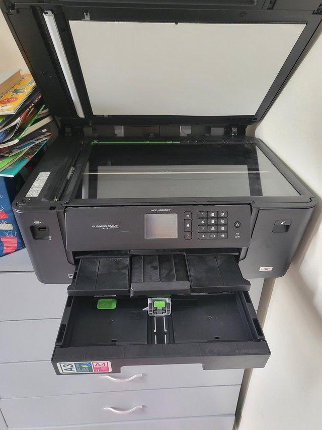 Preview of the first image of Brother scanner and printer available.