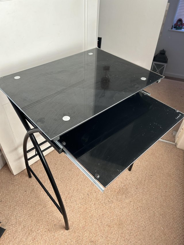 Preview of the first image of Black tempered glass computer desk.