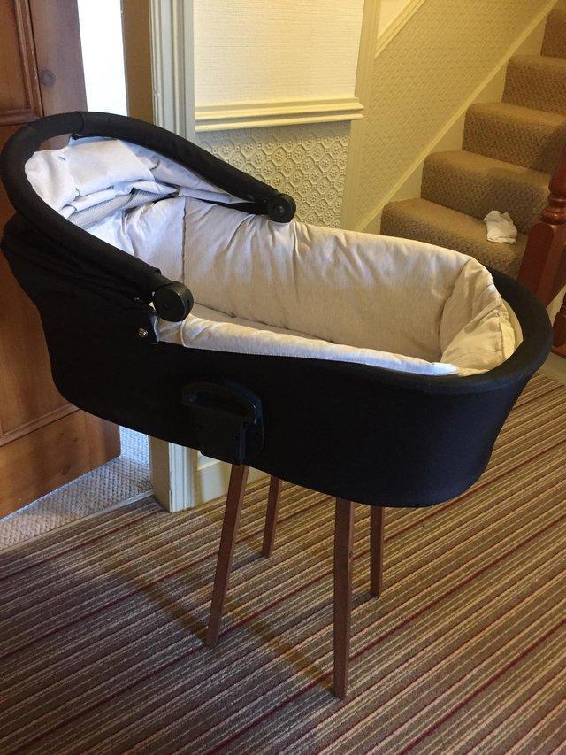Preview of the first image of Clean Navy/black modern carry cot.