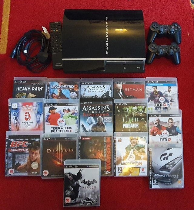 Preview of the first image of PS3 with games and controllers.