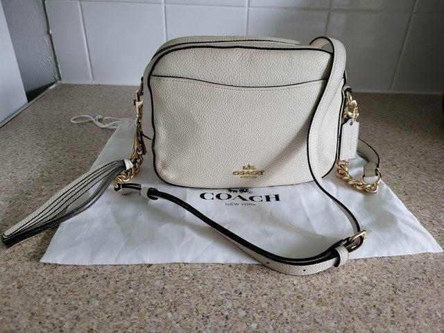 Preview of the first image of Coach ANGIE Crossbody Leather Bag Cream.