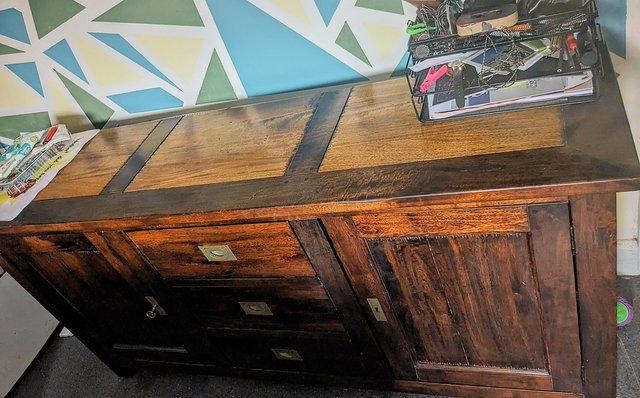 Preview of the first image of Solid wood sideboard very heavy.