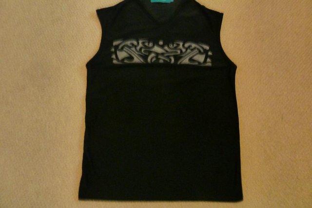 Preview of the first image of Men's Stylish Celtic Black Sleeveless Clubwear Style Top.