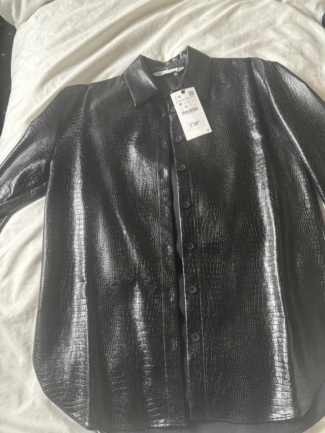 Preview of the first image of Faux leather shirt . Brand new Zara women’s black shirt.