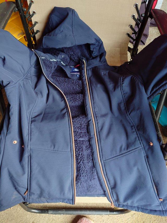 Preview of the first image of Mark Todd ladies coat for sale.