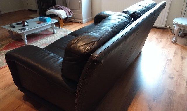 Image 1 of Sofa 2 seater brown leather. Fair condition