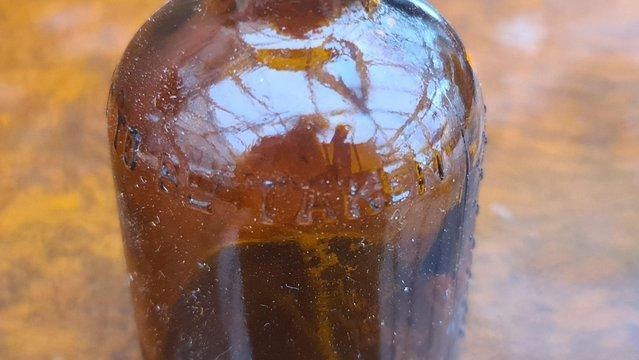 Image 8 of Antique 1920s embossed Lysol bottle amber glass