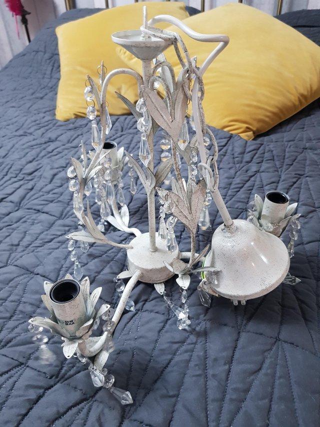 Preview of the first image of Chandelier new beautiful shabby chic very pretty.