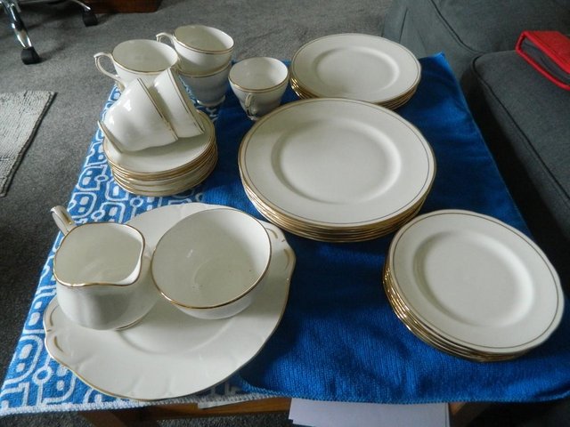 Preview of the first image of "27 piece bone china dinner and tea set.