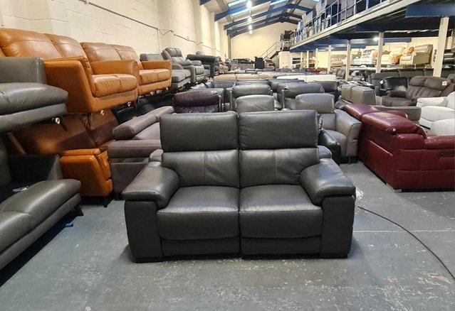 Preview of the first image of Laurence dark grey leather electric recliner 2 seater sofa.