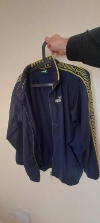 Image 2 of Puma lightweight zip up jacket.