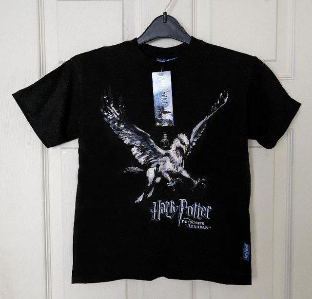 Preview of the first image of BNWT Black Harry Potter Kids T Shirt - Age 5/6 Years.