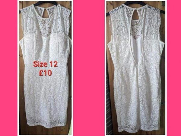 Image 1 of WHITE lace dress - size 12 with zip