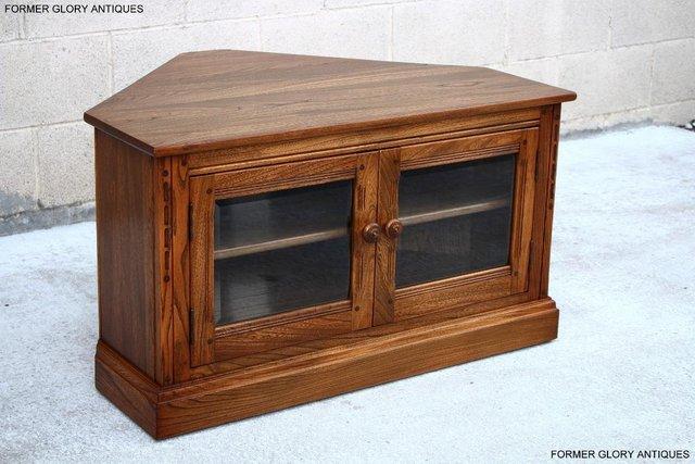 Image 65 of AN ERCOL GOLDEN DAWN ELM CORNER TV CABINET STAND TABLE UNIT