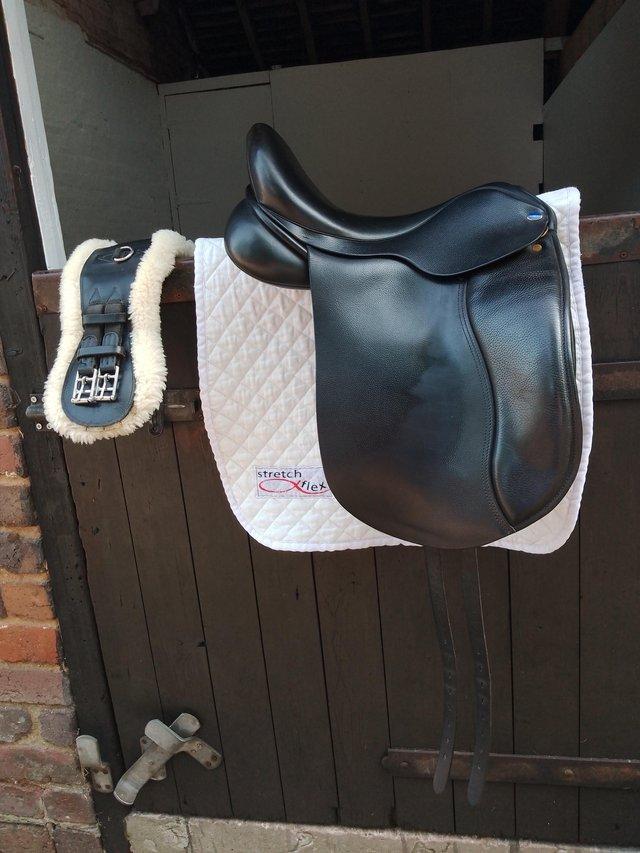 Preview of the first image of Black Dressage Saddle 17 1/2 with extras.