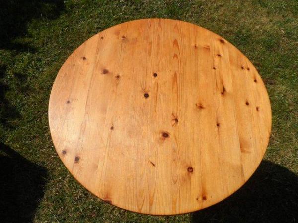 Image 2 of Small pine circular table with a pair of chairs.