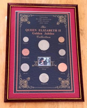 Image 1 of QUEEN ELIZABETH II JUBILEE COLLECTION IN A WOODEN FRAME.