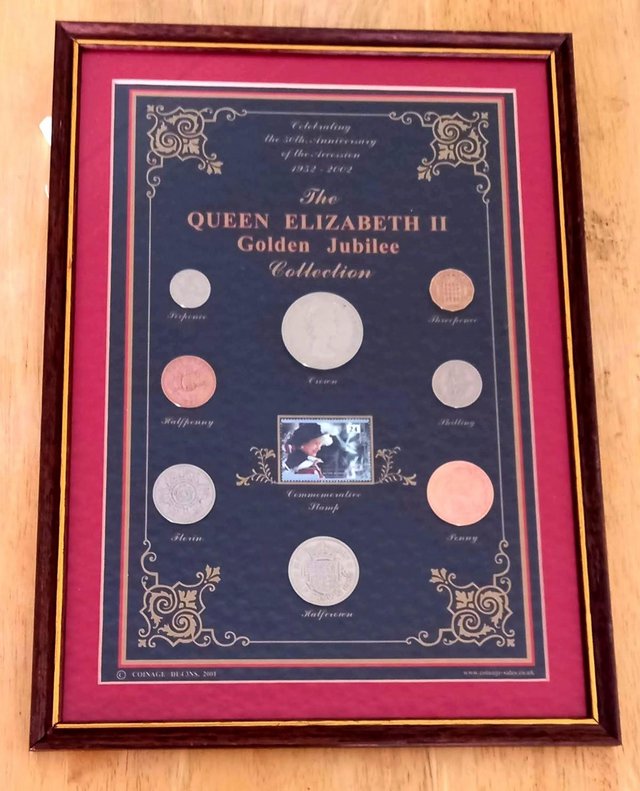 Preview of the first image of QUEEN ELIZABETH II JUBILEE COLLECTION IN A WOODEN FRAME..
