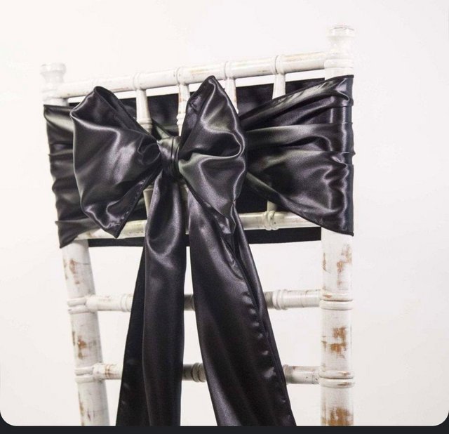Preview of the first image of Black satin chair sashes.
