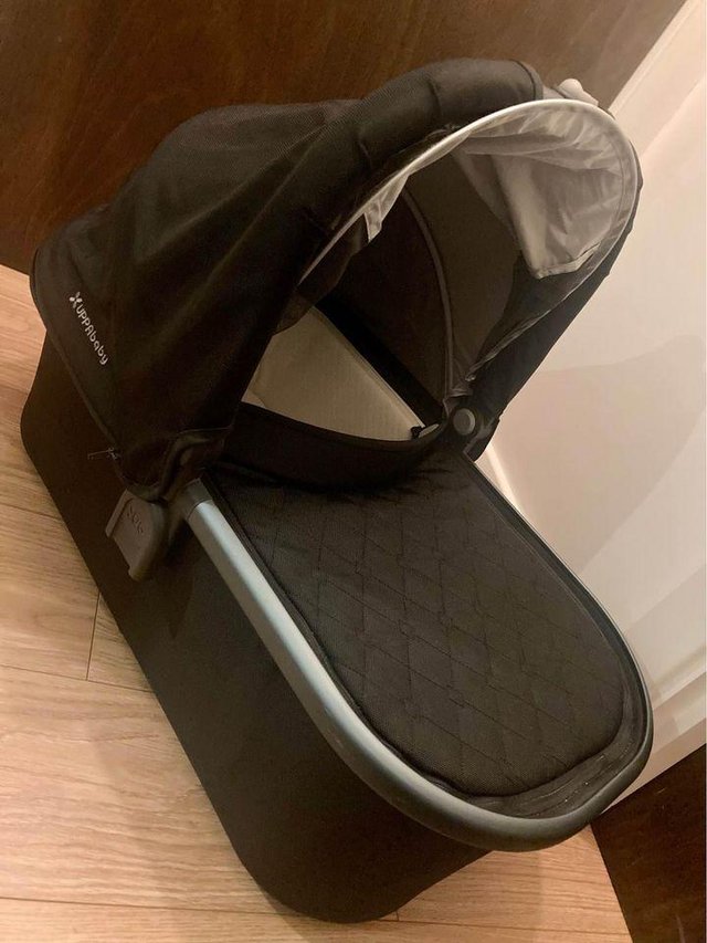 Preview of the first image of UPPAbaby Bassinet with Raincover.