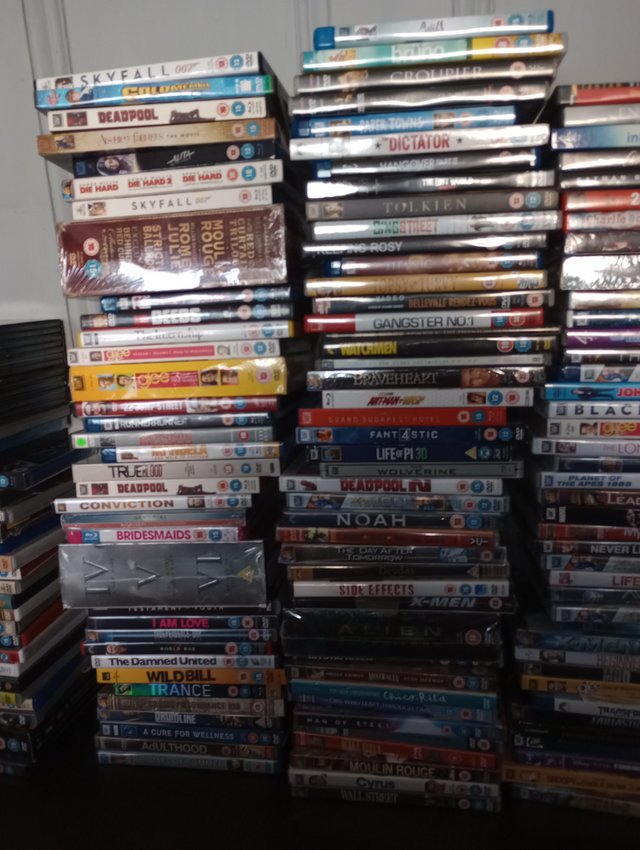 Preview of the first image of DVDs Lot x 150 mostly wrapped.