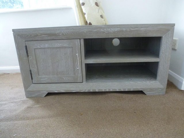 Preview of the first image of OAK FURNITURE LAND Willow range solid oak small TV unit.