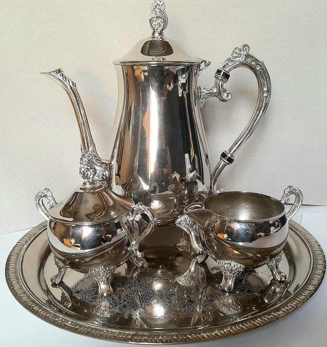Preview of the first image of SILVER - PLATED 4 PIECE TEA SET.