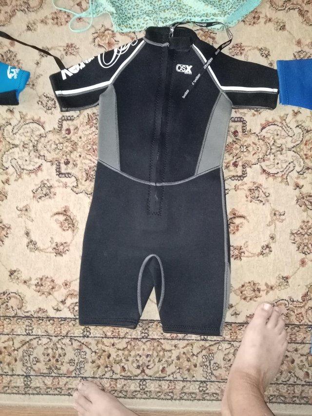 Preview of the first image of For sale, three child's wet suits.
