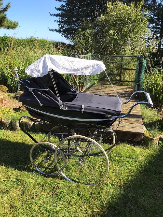 Preview of the first image of Wilson Coachbuilt Pram with large wheels.