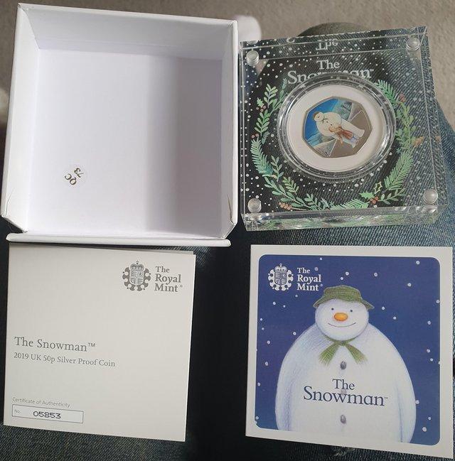 Preview of the first image of R.Mint R.Briggs The Snowman Silver Proof coloured 50p.